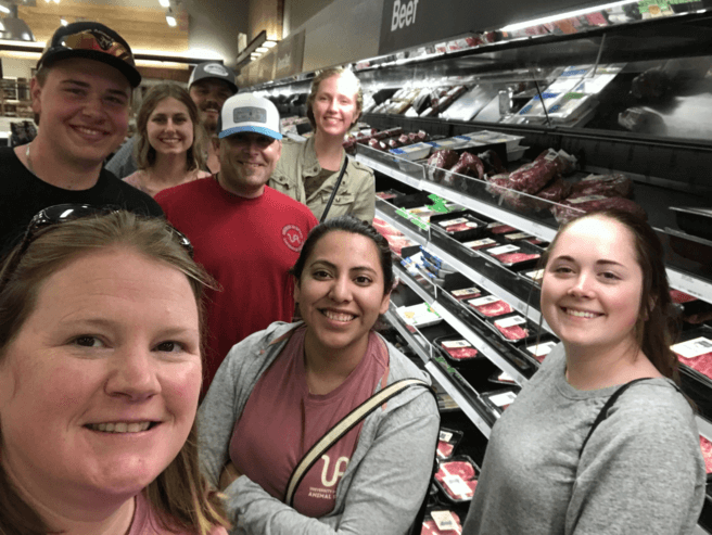 Meats quiz bowl team visiting a meat counter